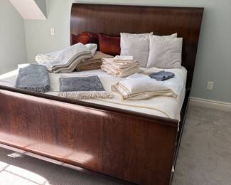 King size bed by Bernhardt, mattress set and plush linens