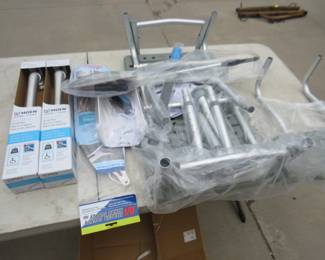 Lot 215. NIP bathroom accessibility items