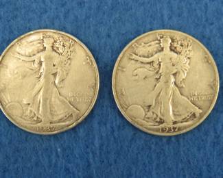 Lot 313. Two Walking Liberty half dollars
