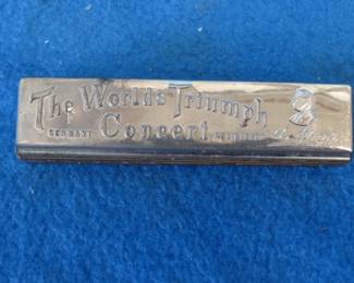 Lot 162. Weiss World's "Triumph" 10-hole tremolo harmonica. Sounds great.