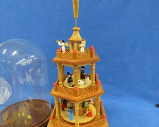 Lot 208. Glass Domed Display case. Vintage wooden Nativity Carousel.
