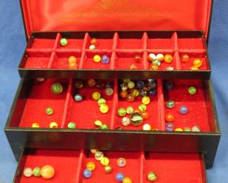 Lot 171. Jewelry box with marbles