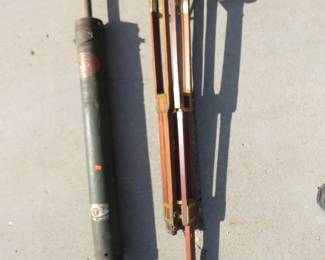 Lot 272. Antique manual pump vacuum and an old tripod