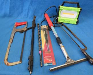 Lot 121. Saws, huge drill bit, shop light, and more