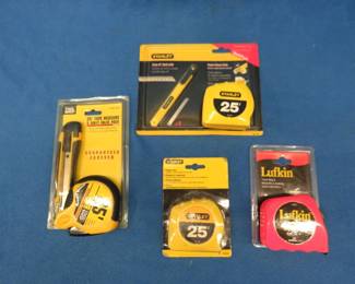 Lot 268. Four new-in-the-package tape measures including two Stanley's