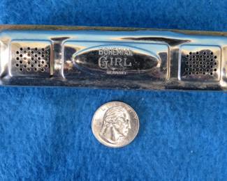 Lot 166. Schunk Bohemian Girl diatonic 40-hole harmonica.