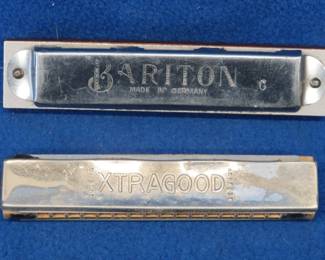 Lot 92. Two vintage harmonicas: Unknown maker Bariton 32-hole tremolo harmonica in the key of C. P. Pohl "Xtragood" harmonica with poor sound.