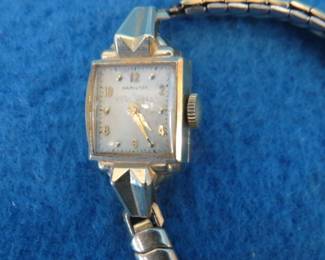 Lot 247. Hamilton ladies' watch and case from 1952. Case is marked 14KGOLD.