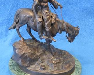 Lot 126. Russian or German 16 lb. bronze sculpture depicting two Cossacks on a horse, often entitled "Lovers on a Ride." Without the base it is 11 inches high.