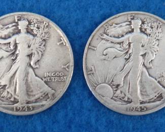 Lot 309. Two Walking Liberty half dollars