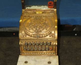 Lot 206. 1897 National Cash register on an oak base. S/N 1258058. Appears to be complete and in good working condition. Dimensions in inches: 15 x 9 x 16. No shipping on this item.