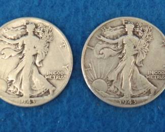 Lot 311. Two Walking Liberty half dollars