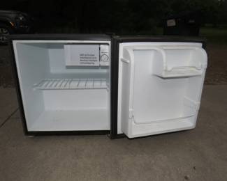 Lot 222. Dorm room refrigerator. Powers up