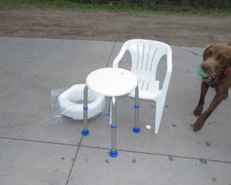 Lot 192. Child's chair, shower stool, and NIB a toilet seat riser
