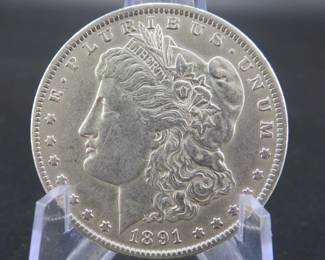 Lot 37. 1891 P Morgan silver dollar