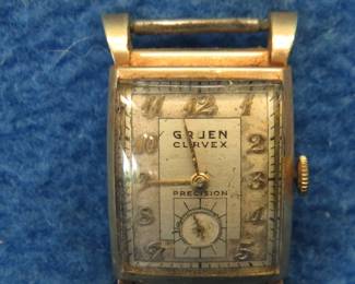 Lot 308. Gruen Curvex Precision art deco tank watch and case. Not running.