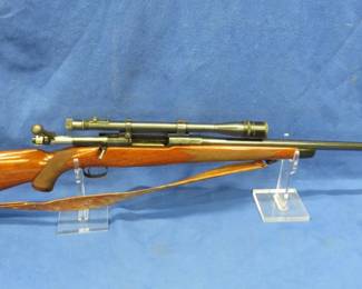 Lot 18. Winchester bolt-action, S/N: 50883, 22-250 rifle with a Weaver scope and sling