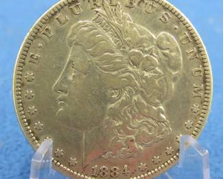 Lot 242. 1884 P Morgan silver dollar