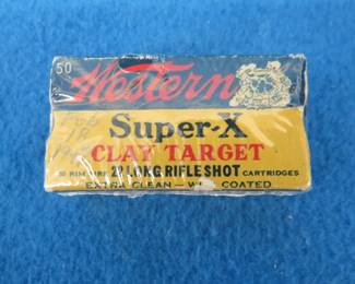 Lot 343. Owner wrapped box of very rare Western Super-X 22 long rifle clay target shot. Box feels full and is in very good condition. Date written in pencil on box of Feb. 18, 1947.