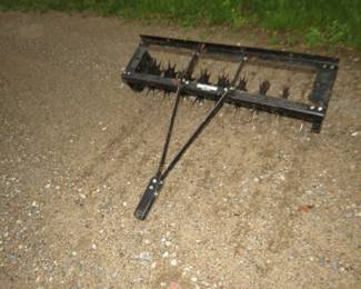Lot 200. Craftsman pull-behind aerator