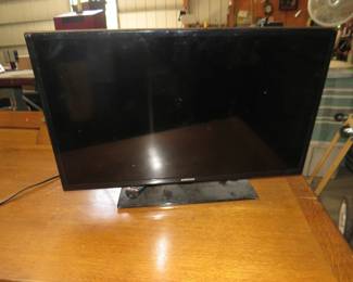 Lot 317. 32-inch Samsung TV with remote