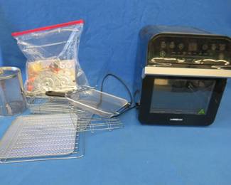 Lot 54. GoWISE air fryer oven with all accessories shown. Model GW44800-0. Appears to have had very little use.