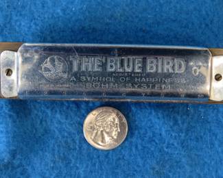 Lot 167. F. A. Bohm "The Blue Bird" 20-reed tremolo harmonica in the key of C. Sounds great.