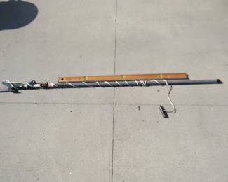 Lot 286. Stanley level and a pole saw