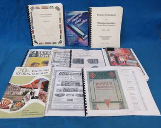 Lot 98. Harmonica books and ephemera