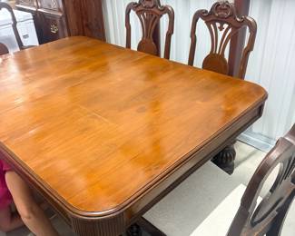Antique Jacobean Revival dining room set featuring extension table and 6 chairs