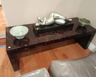 Statue $95, lacquer wood side console $95