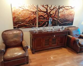 Pair of custom leather chairs $475