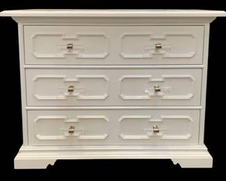 289 - Chelsea House River Street Chest (Description): 32 x 42 x 20, A fresh perspective that was inspired by a classic piece, the 3-drawer River Steet Chest is an inviting silhouette with a garden trellis design finished in white lacquer and modern acrylic handles. Perfect for any entryway or living room. Designed by Bill Cain.
