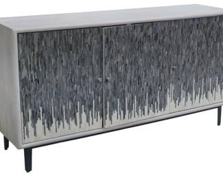 131 - Coast to Coast Kai 3 Door Credenza (Description): gray & white, 35.5 x 68 x 18, Finished in our Kai Grey & White Bone Inlay and perched atop a metal base, this credenza exudes a refined elegance that is often sought after, but rarely found. It is as functional as it is beautiful with plenty of storage space behind its four doors.