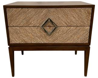 265 - Chelsea House Vika Side Table (Description): 26 x 28 x 18, Retail $2298, The Vika Side Table combines modern sophistication with natural warmth. Featuring two spacious drawers accented with hand-applied textured fronts, it s finished with a rich dark wood frame and a striking diamond-shaped metal pull. The tapered legs and sleek silhouette make it a versatile piece that complements both classic and contemporary interiors. Perfect as a bedside table or living room