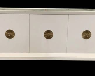 256 - Wildwood Beveled Sideboard (Description): 32 x 64 x 19, Retail $4598, Beveled wood sideboard with three doors, three adjustable shelves and tempered clear glass top insert. Custom painted in customer's selection of any benjamin moore paint color. Please provide color name and number.