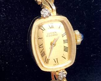 a Licien Piccard 14k gold ladies watch