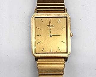 clean Seiko mens gold tone watch
