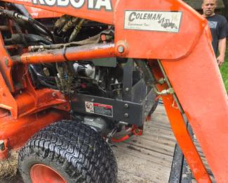 Kubota 4 wheel drive lawn tractor with bucket