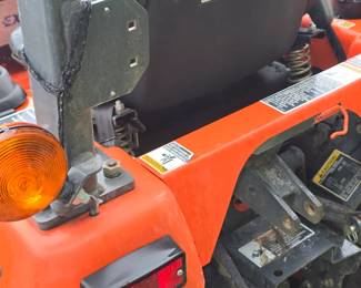Kubota 4 wheel drive lawn tractor with bucket