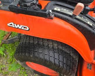 Kubota 4 wheel drive lawn tractor with bucket