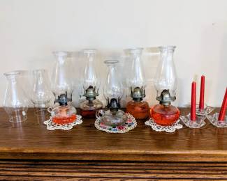 Vintage oil lamps and candlesticks