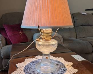 Vintage hurricane lamp and doily
