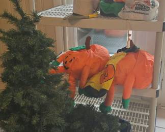 Prelit Christmas trees in urns