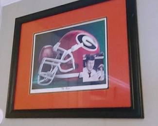The Voice" and the signature "Larry Munson" belong to the legendary Georgia Bulldogs radio broadcaster 224/2000