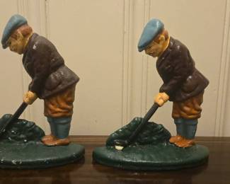 Vintage painted cast iron golfer doorstops