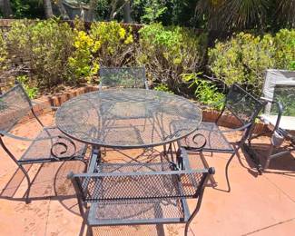 Many pieces of beautiful vintage wrought iron outdoor furniture very heavy