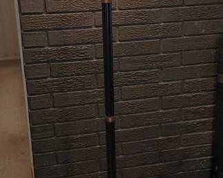 Wrought on floor lamp located on the hearth next to the checkout