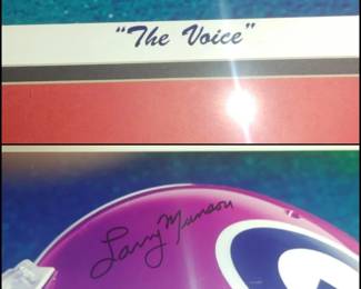 The Voice" and the signature "Larry Munson" belong to the legendary Georgia Bulldogs radio broadcaster. 224/2000
