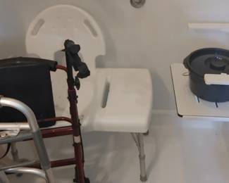 Handicap shower seat handicap Walker with seat located in the master bathroom